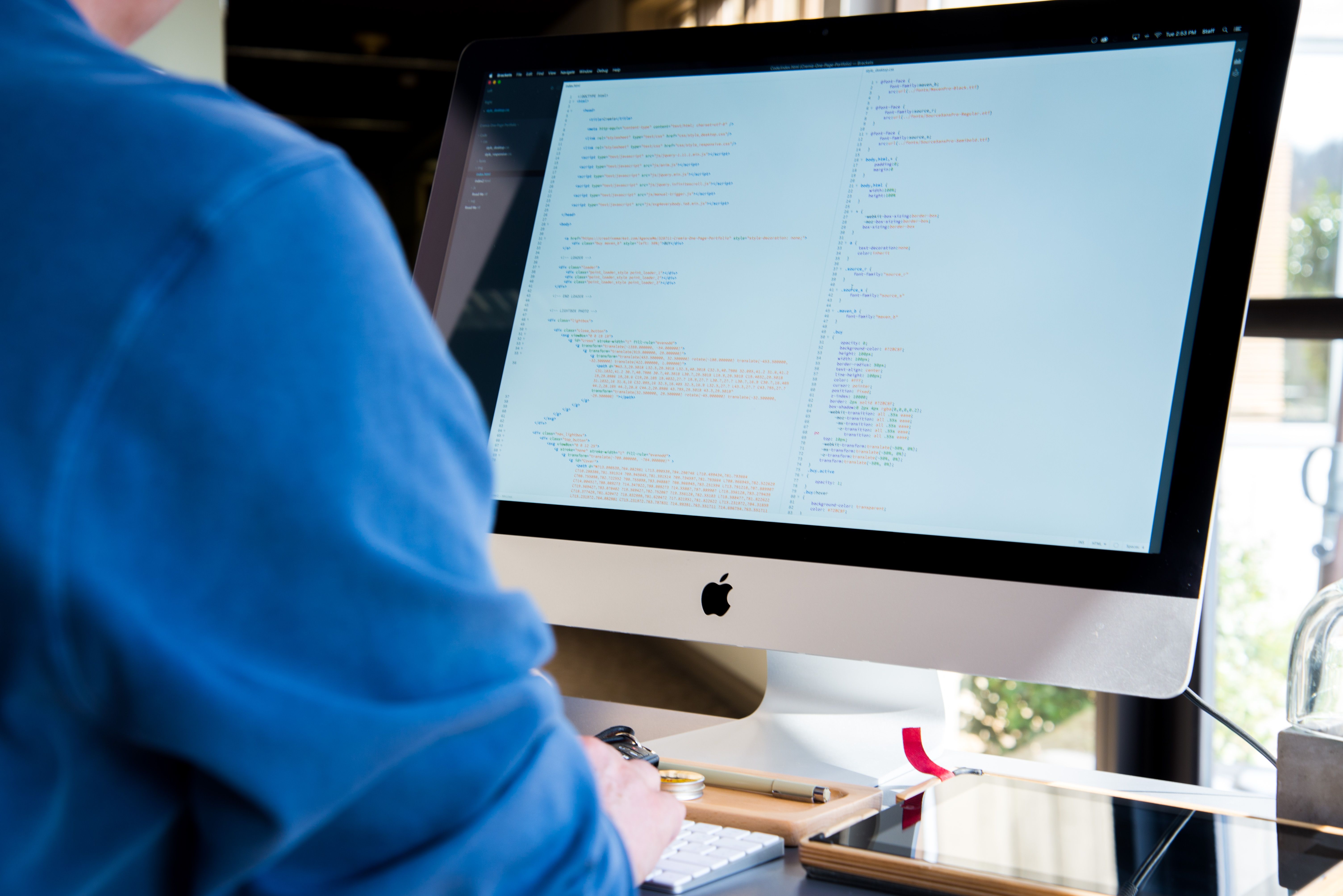 Developer writing code to optimize website performance